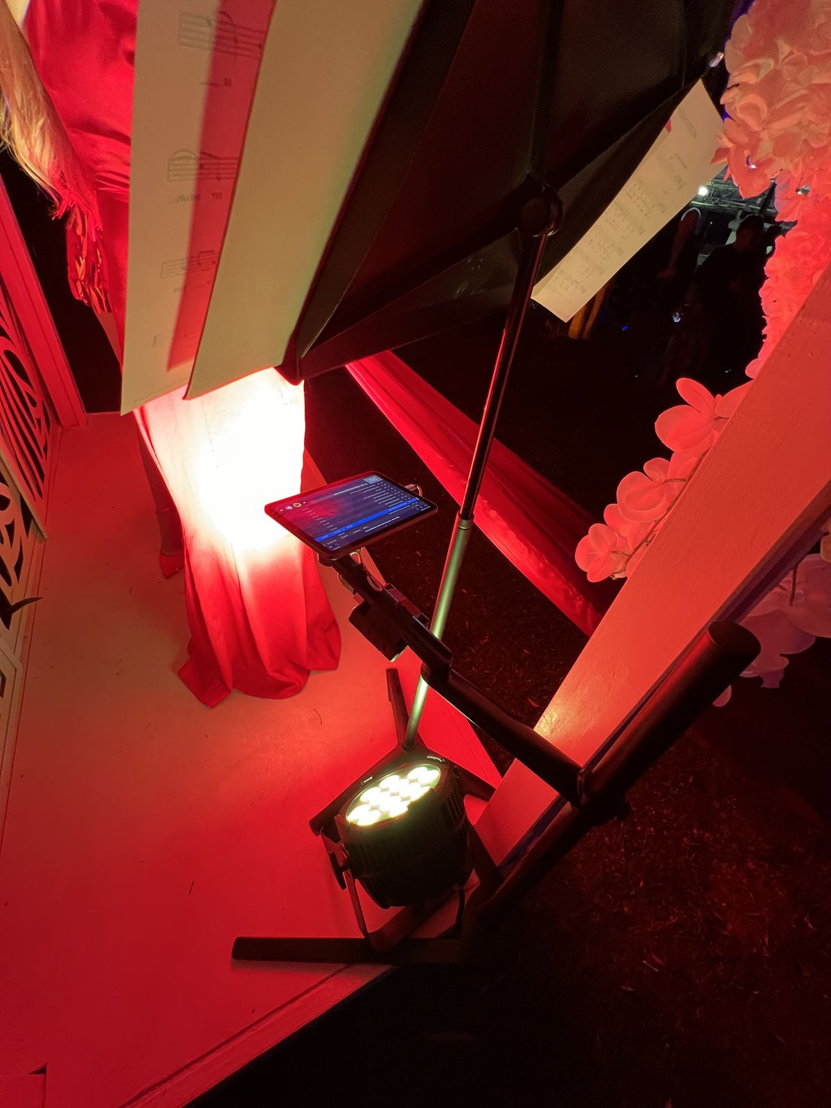 LED uplight and iPad mixer tucked into a lit pergola at Corbould Park
