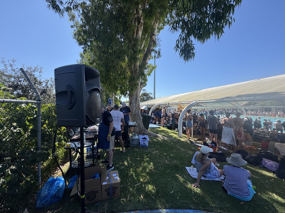 PA speaker on a stand beside the crowd at a Maroochydore swimming carnival