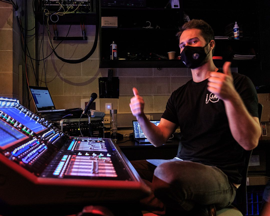 Jack Scandrett at a digital mixing console