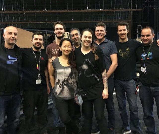 Sound crew on stage during a bump-in