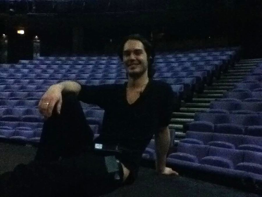 Jack in an empty auditorium before a show