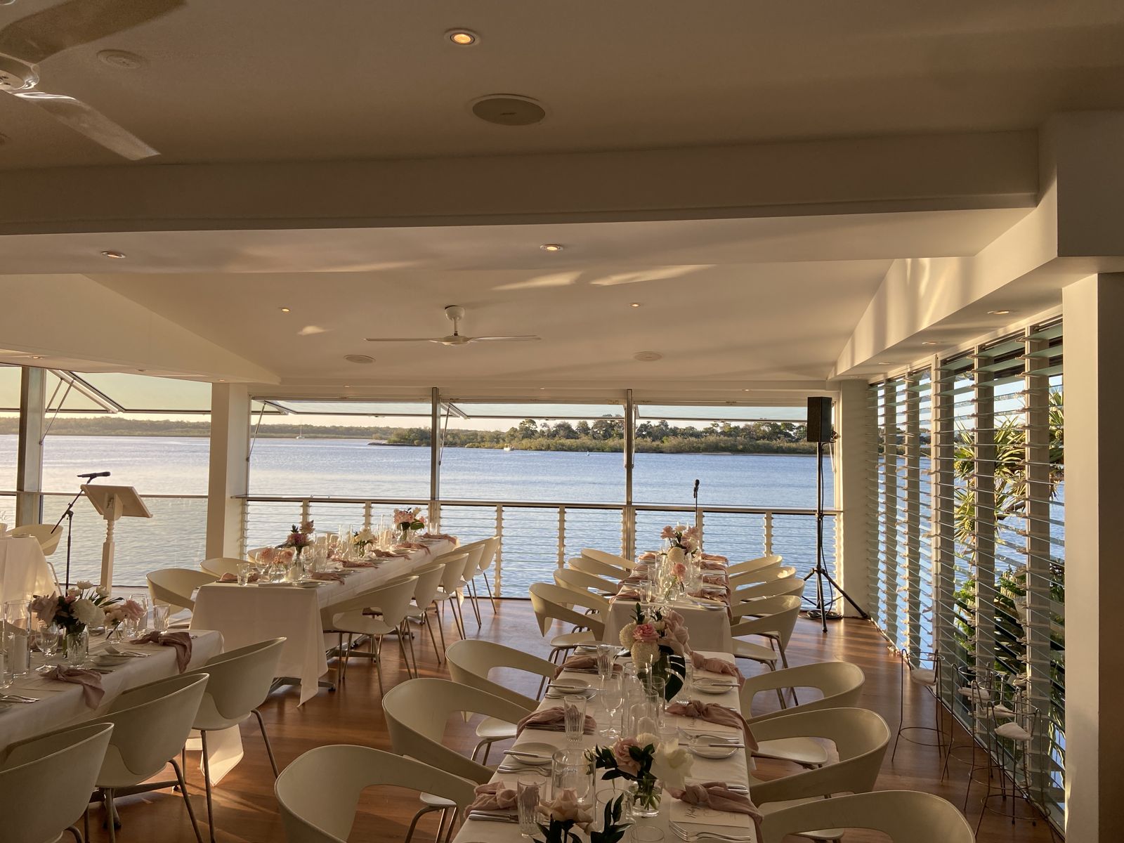 Noosa riverfront wedding reception set with the river behind