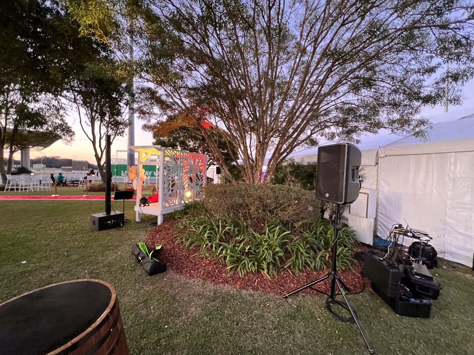 Speaker set up on the lawn at Corbould Park Racecourse